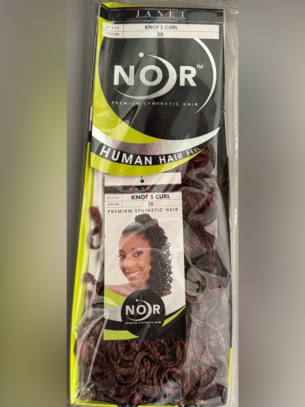 Janet collection. Noir premium synthetic hair. Knot S curl.